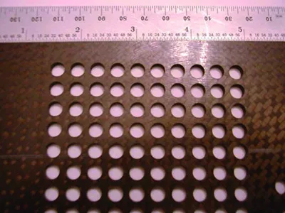 Composite material cutting